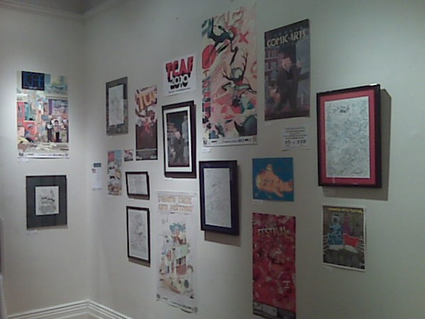 TCAF's set-up at last week's SpeakEasy art show, a plethora of posters and promotional art by talented artists!